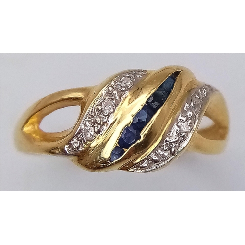 477 - A 18K YELLOW GOLD DIAMOND & SAPPHIRE RING, IN THE SWIRL DESIGN 1.8G SIZE L