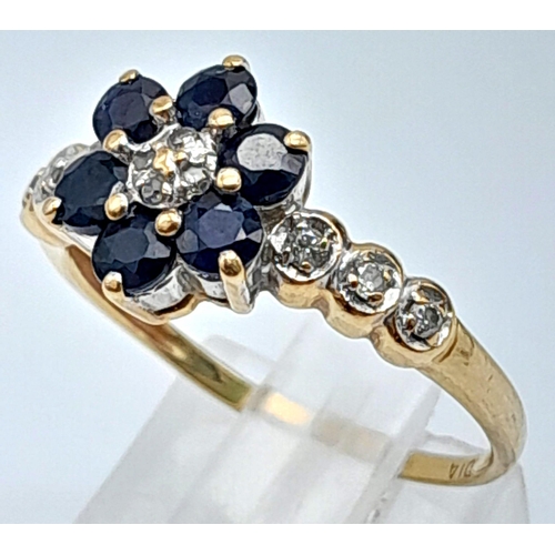 772 - A 9K YELLOW GOLD DIAMOND & SAPPHIRE CLUSTER RING IN THE FLORAL DESIGN 2G SIZE O/P
ref: A/S 4008