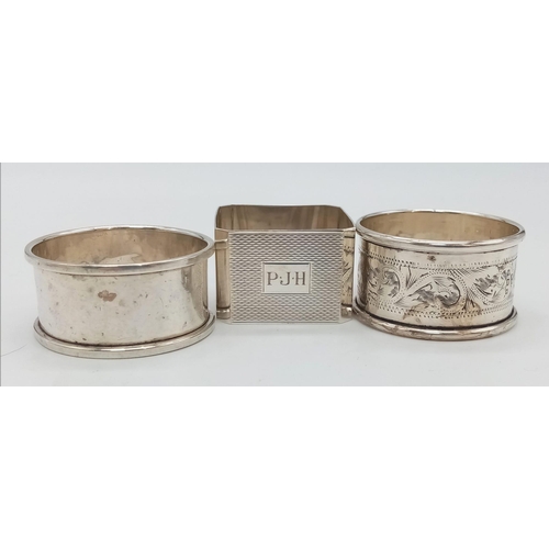 1792 - A Parcel of Three Antique and Vintage Silver and White Metal Napkin Rings
Comprising; 
1) An 1852 Ha... 