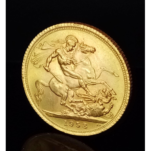 1 - A 1958 Queen Elizabeth II 22K Gold Full Sovereign. EF.