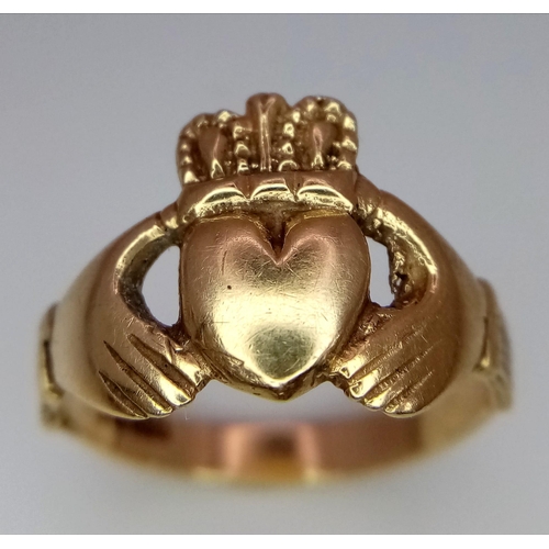 755 - A 9K YELLOW GOLD CLADDAGH RING. 3.2G. SIZE O