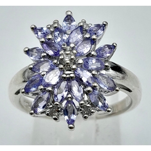 1222 - A STERLING SILVER DIAMOND & IOLITE SET MARQUISE SHAPED CLUSTER RING. TOTAL WEIGHT 4.2G. SIZE P