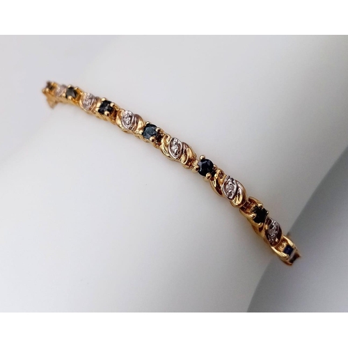 268 - A 9K DIAMOND & SAPPHIRE BRACELET WITH SAFETY CATCH.
18CM. 7.4G TOTAL WEIGHT.