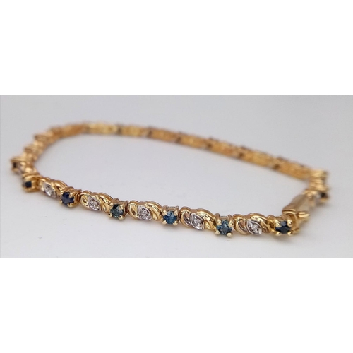 268 - A 9K DIAMOND & SAPPHIRE BRACELET WITH SAFETY CATCH.
18CM. 7.4G TOTAL WEIGHT.