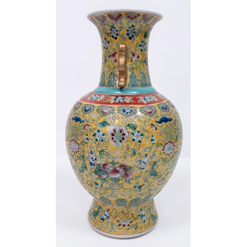 412 - A large Chinese Famille Jaune Imperial Yellow Vase. Early 20th Century, marked on the base and stand... 