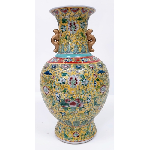 412 - A large Chinese Famille Jaune Imperial Yellow Vase. Early 20th Century, marked on the base and stand... 