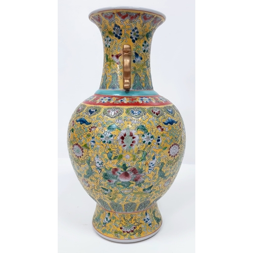 412 - A large Chinese Famille Jaune Imperial Yellow Vase. Early 20th Century, marked on the base and stand... 