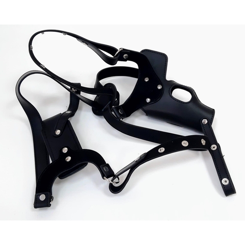 777 - A C.I.A. STYLE SHOULDER HOLSTER DESIGNED FOR THE LEFT ARMPIT , MADE IN BLACK LEATHER AND WITH DETACH... 