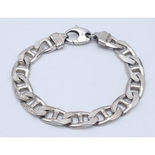 779 - A STERLING SILVER ANCHOR LINK BRACELET 37.5G 21.5cm length
ref: A/S 4021