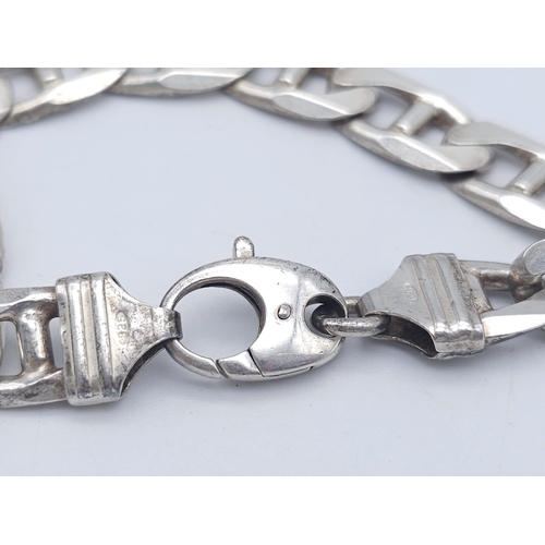 779 - A STERLING SILVER ANCHOR LINK BRACELET 37.5G 21.5cm length
ref: A/S 4021