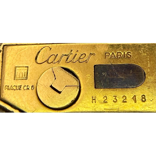 270 - A Vintage Cartier Gold Plated Lighter. Needs a service/repair so a/f. 7cm x 2.5cm. UK Mainland Sales... 
