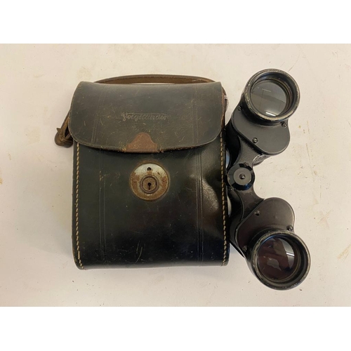 306 - A Pair of WW2 German 6 x 30 Binoculars in Leather Case. Optics are good. The latch on the case are b... 