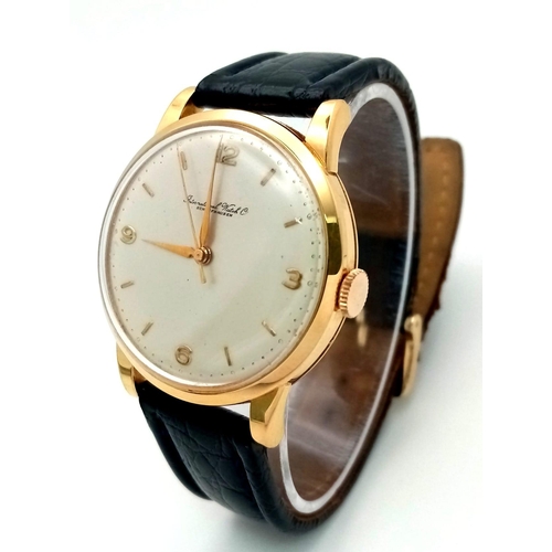 395 - A Vintage 18K Gold Cased International Watch Co. Shaffhausen Gents Watch. Black leather strap. 18k g... 