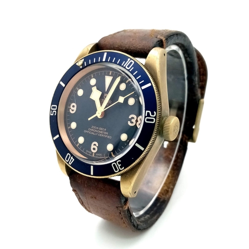 66 - A TUDOR CHRONOMETER GENTS WRISTWATCH WITH BLUE DIAL AND MATCHING BEZEL .  44mm    14758