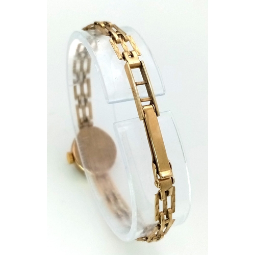 89 - A Vintage 9K Gold RJW Ladies Watch. 9k gold link bracelet. 9K gold oval case - 15mm. Gold tone dial.... 