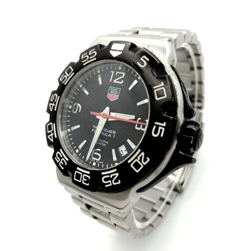 150 - A Tag Heuer Formula 1 Quartz Gents Watch. Stainless steel bracelet and case - 42mm. Black dial with ... 