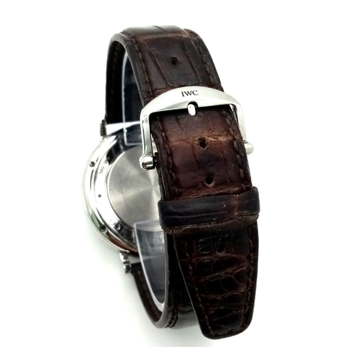 157 - A Sophisticated IWC Portofino Automatic Gents Watch. Original brown leather strap. Stainless steel c... 