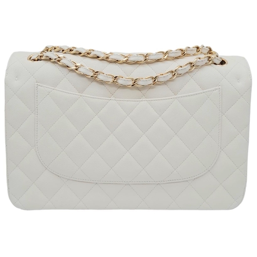 2 - Chanel Caviar Jumbo Single Flap Bag.
Quilted white caviar leather stitched in diamond pattern. Gold ... 