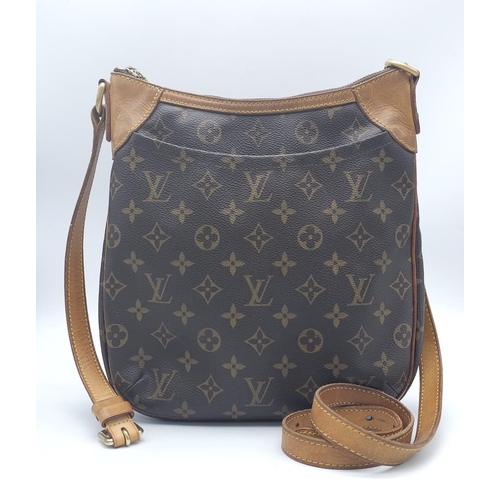 347 - Louis Vuitton Crossover Satchel Bag.
Quality leather exterior with famed LV monogrammed pattern. Ver... 