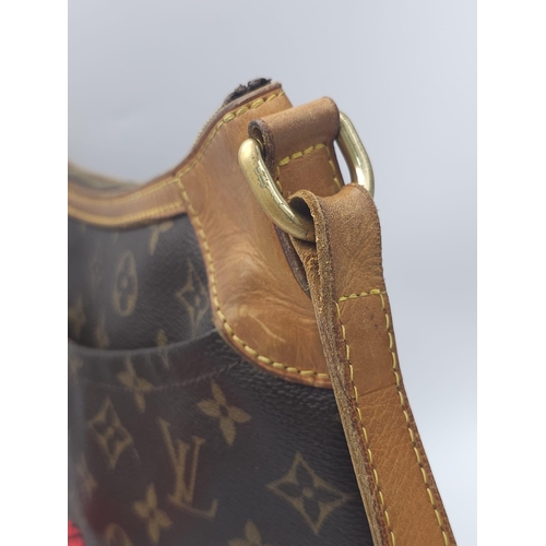 347 - Louis Vuitton Crossover Satchel Bag.
Quality leather exterior with famed LV monogrammed pattern. Ver... 