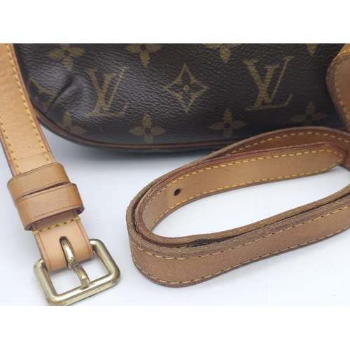 347 - Louis Vuitton Crossover Satchel Bag.
Quality leather exterior with famed LV monogrammed pattern. Ver... 