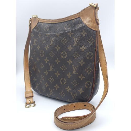 347 - Louis Vuitton Crossover Satchel Bag.
Quality leather exterior with famed LV monogrammed pattern. Ver... 