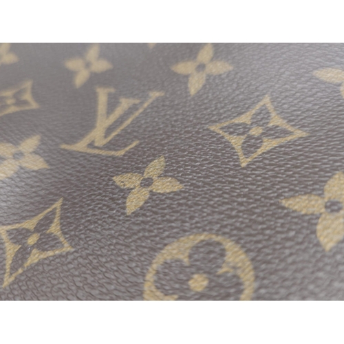 347 - Louis Vuitton Crossover Satchel Bag.
Quality leather exterior with famed LV monogrammed pattern. Ver... 