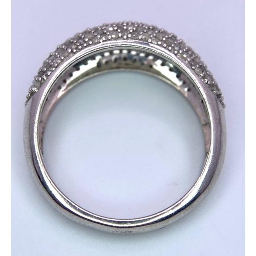 437 - A 9K White Gold (tested) Pave Diamond Band Ring. Size P. 3.45g total weight.