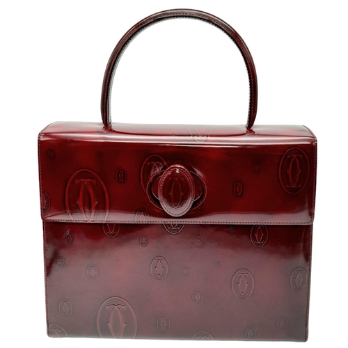 172 - Cartier Burgundy 'Happy Birthday' Handbag.
Stunning monogramed patent leather, rich in colour. Silve... 