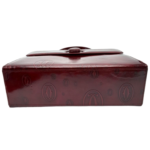 172 - Cartier Burgundy 'Happy Birthday' Handbag.
Stunning monogramed patent leather, rich in colour. Silve... 