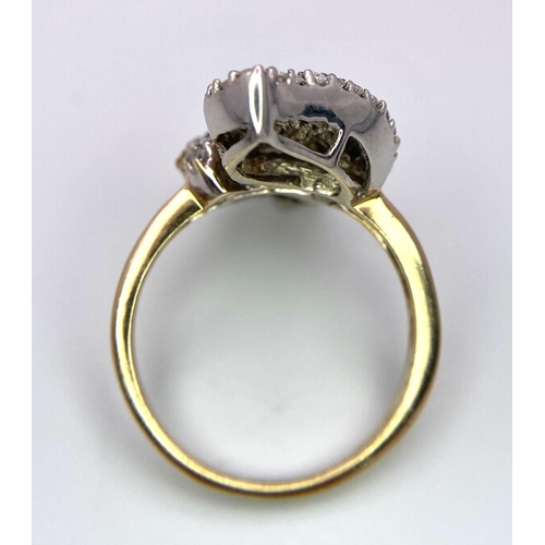 300 - A fabulous 18 K yellow and white gold ring loaded with round cut and baguette diamonds in a twisted ... 