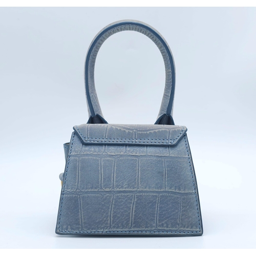 354 - A Jacquemus Duck Egg Blue 'Chiquito' Mini Bag. Croc-embossed leather exterior, with gold toned name ... 