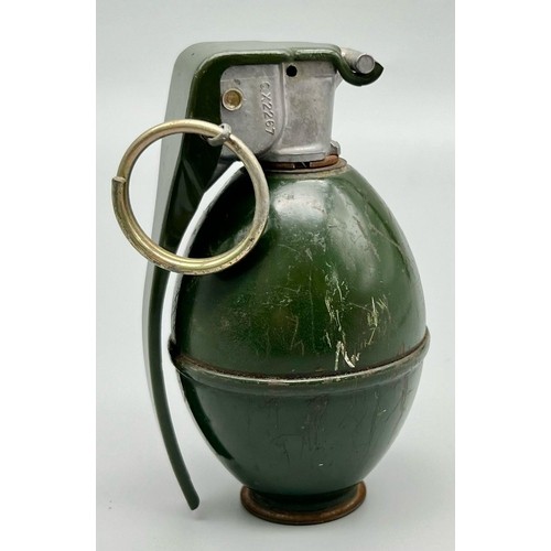 392 - INERT Vietnam War Era US M26 hand grenade. The grenade with a smooth casing and a single rib along t... 