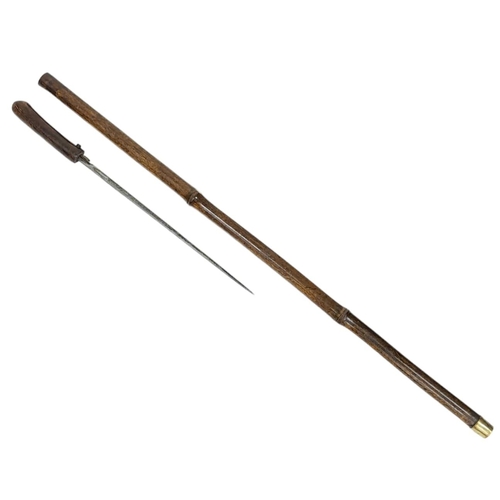 339 - Bamboo Antique Sword Stick.
Standing 88cm tall, this stylish sword stick features an intriguing butt... 