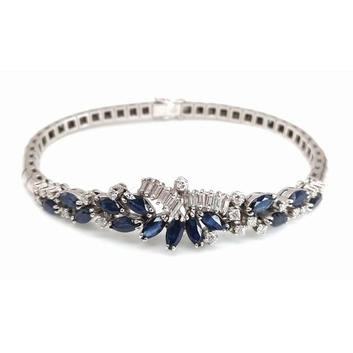 115 - A FABULOUS ART DECO STYLE ARTICULATED BRACELET IN 18K WHITE GOLD WITH DIAMONDS AND SAPPHIRES .  21.5... 