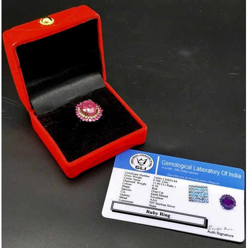 1767 - An 11.40ct Ruby Gemstone Ring with a 0.50ct Diamond Halo. Set in 925 Silver. Size M/N. Comes with a ... 