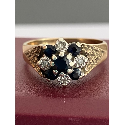 147 - 9 carat GOLD RING set with DIAMONDS and SAPPHIRES. Full UK hallmark. 3.75 grams. Size N 1/2.