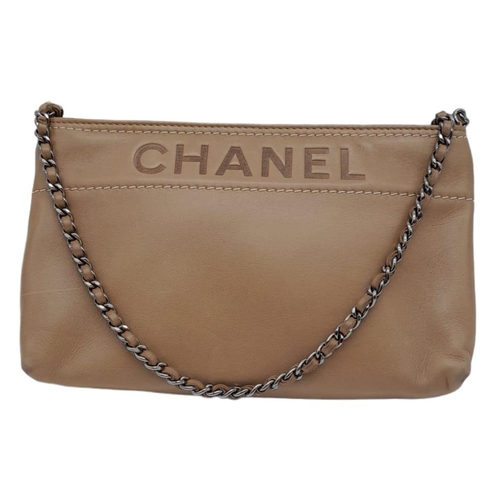 251 - A Vintage Chanel Beige Shoulder Bag. Soft leather exterior, with silver toned hardware, single shoul... 