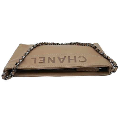 251 - A Vintage Chanel Beige Shoulder Bag. Soft leather exterior, with silver toned hardware, single shoul... 