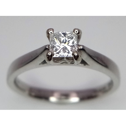 283 - A platinum diamond solitaire ring with a wonderful princess cut diamond (0.43 carats) carrying a Bri... 