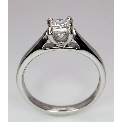 283 - A platinum diamond solitaire ring with a wonderful princess cut diamond (0.43 carats) carrying a Bri... 