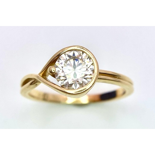 314 - An impressive 14 K yellow gold diamond solitaire ring with a a round brilliant cut diamond of 1 cara... 