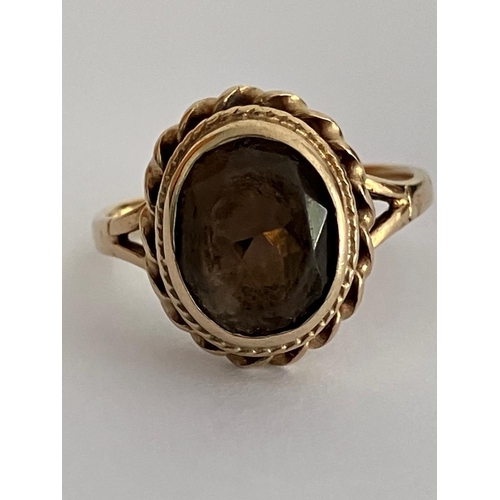 364 - Beautiful 9 carat GOLD RING with large (2.0 carat) oval cut dark GARNET set to top. Attractive mount... 