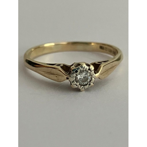 385 - 9 carat GOLD and DIAMOND SOLITAIRE RING. Dainty illusion set ring with attractive shoulder detail. F... 