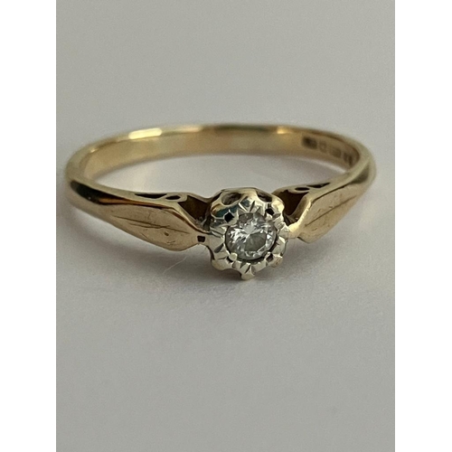 385 - 9 carat GOLD and DIAMOND SOLITAIRE RING. Dainty illusion set ring with attractive shoulder detail. F... 