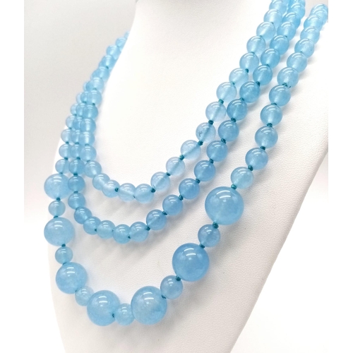 458 - A Rope Length Graduated Blue Jade Bead Necklace. Perfect for different wearing arrangements. 140cm n... 