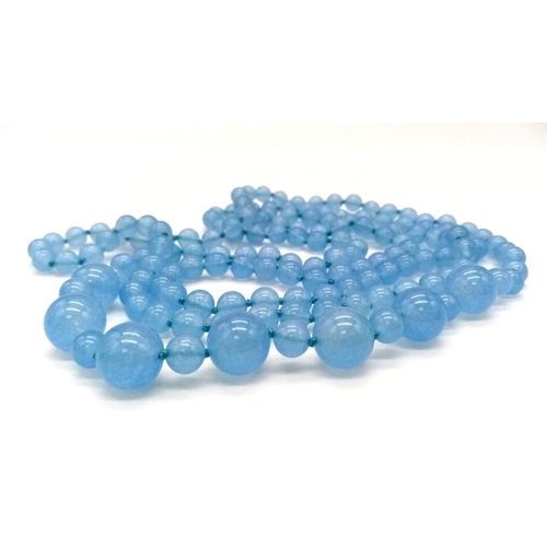 458 - A Rope Length Graduated Blue Jade Bead Necklace. Perfect for different wearing arrangements. 140cm n... 