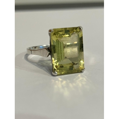 469 - Large YELLOW AMETHYST RING Emerald cut and set in SILVER . Complete with ring box. Size U.