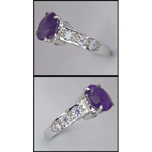 1781 - An Amethyst and White Stone 925 Silver Ring. Amethyst -3ct. 4g total weight. Size M. Comes with a pr... 