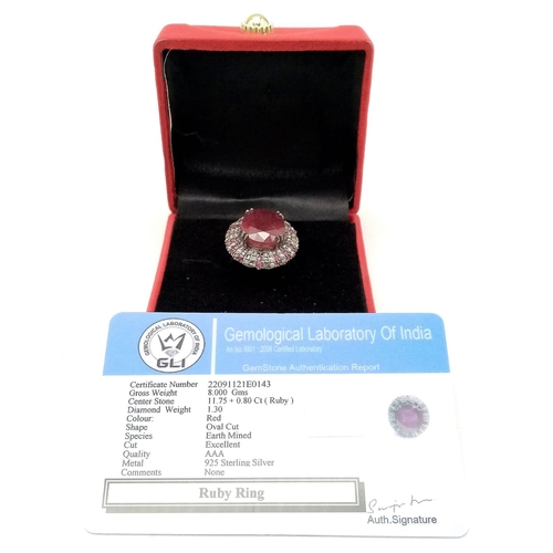 1773 - An 11.75ct Oval Ruby Ring with 0.80ctw of Ruby and 1.3ctw of diamond accents. Set in 925 silver. Siz... 